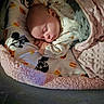 Addison is registered to the contest to win money with this photo: baby, sleeping, blanket, mickey_mouse, soft_texture, pink, green, bedding, infant, cozy, pattern, foot, toes, pajamas, child, cute, resting, indoors, portrait, peaceful
