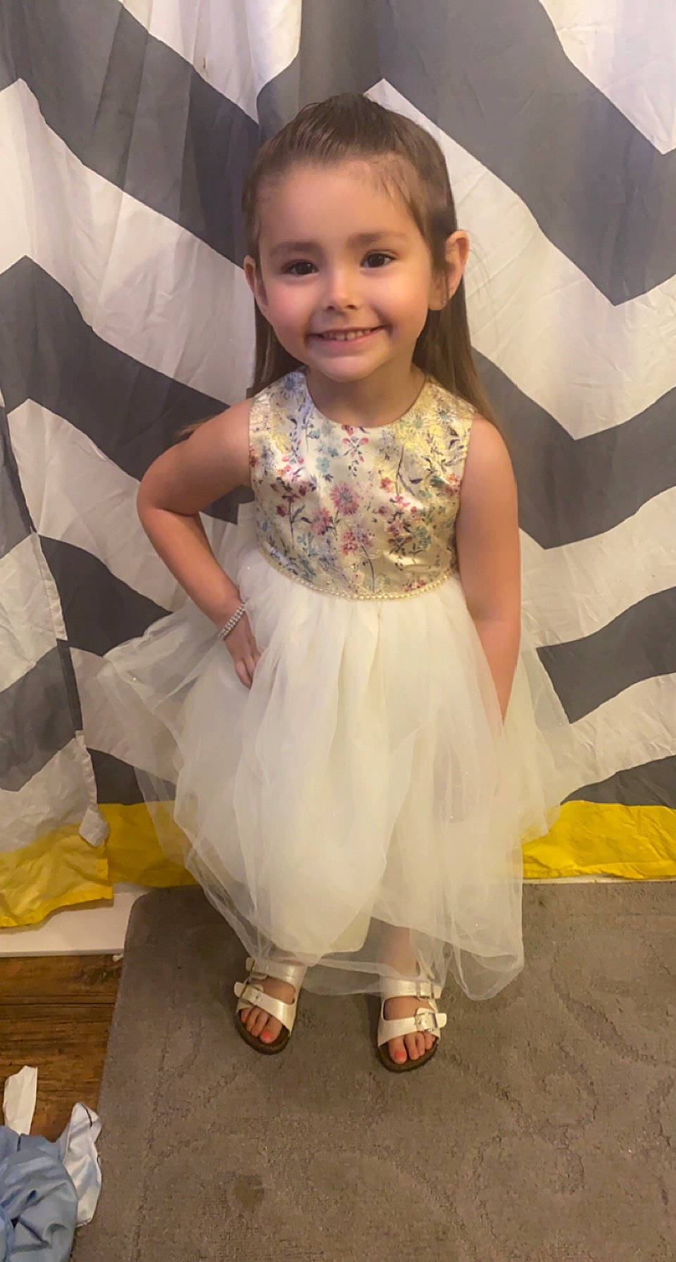 Chanel is registered to the contest to win money with this photo: baby_toddler_clothing, day_dress, dress, event, eye, face, fashion_design, flash_photography, floor, flooring, formal_wear, happy, head, iris, joy, pattern, person, sandal, skin, sleeve
