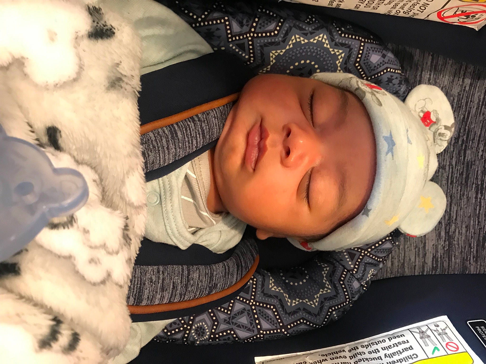 Carmelo is registered to the contest to win money with this photo: baby, baby_toddler_clothing, cheek, child, comfort, eye, eyelash, face, head, headgear, headwear, human_body, iris, linens, mouth, nose, pattern, person, skin, sleeve