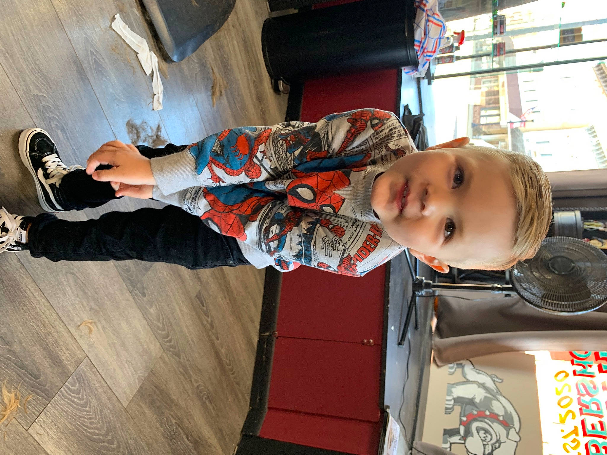 Ross is registered to the contest to win money with this photo: child, flooring, fun, hardwood, human_leg, outdoor_shoe, person, recreation, sneakers, thigh, toddler, walking_shoe, wood