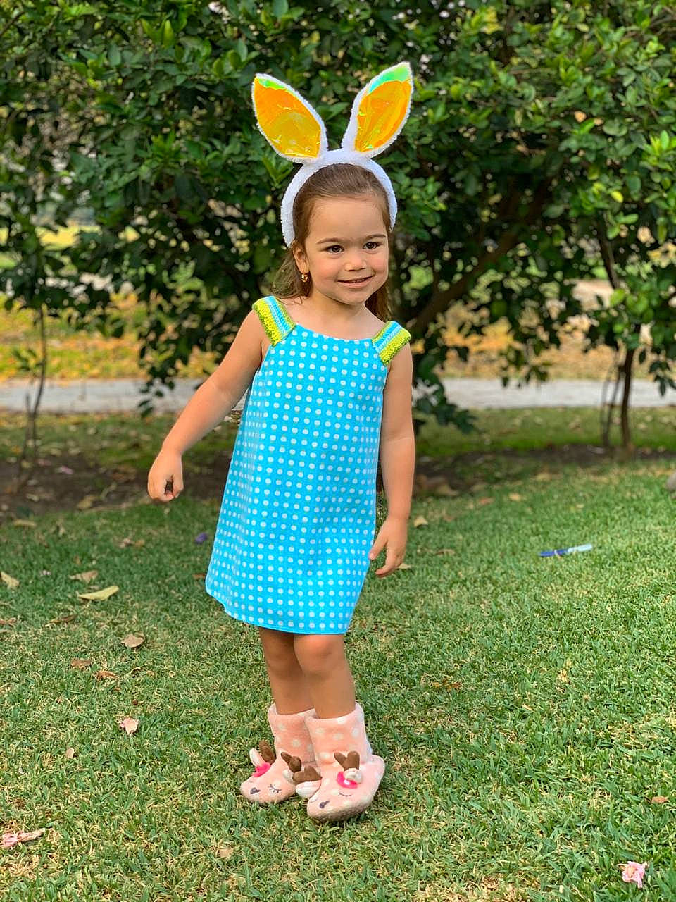 Emma joined the competition — help win amazing prizes! child, clothing, dress, ear, easter, easter_bunny, fawn, grass, holiday, joy, pattern, person, plant, rabbit, toddler, turquoise, yellow