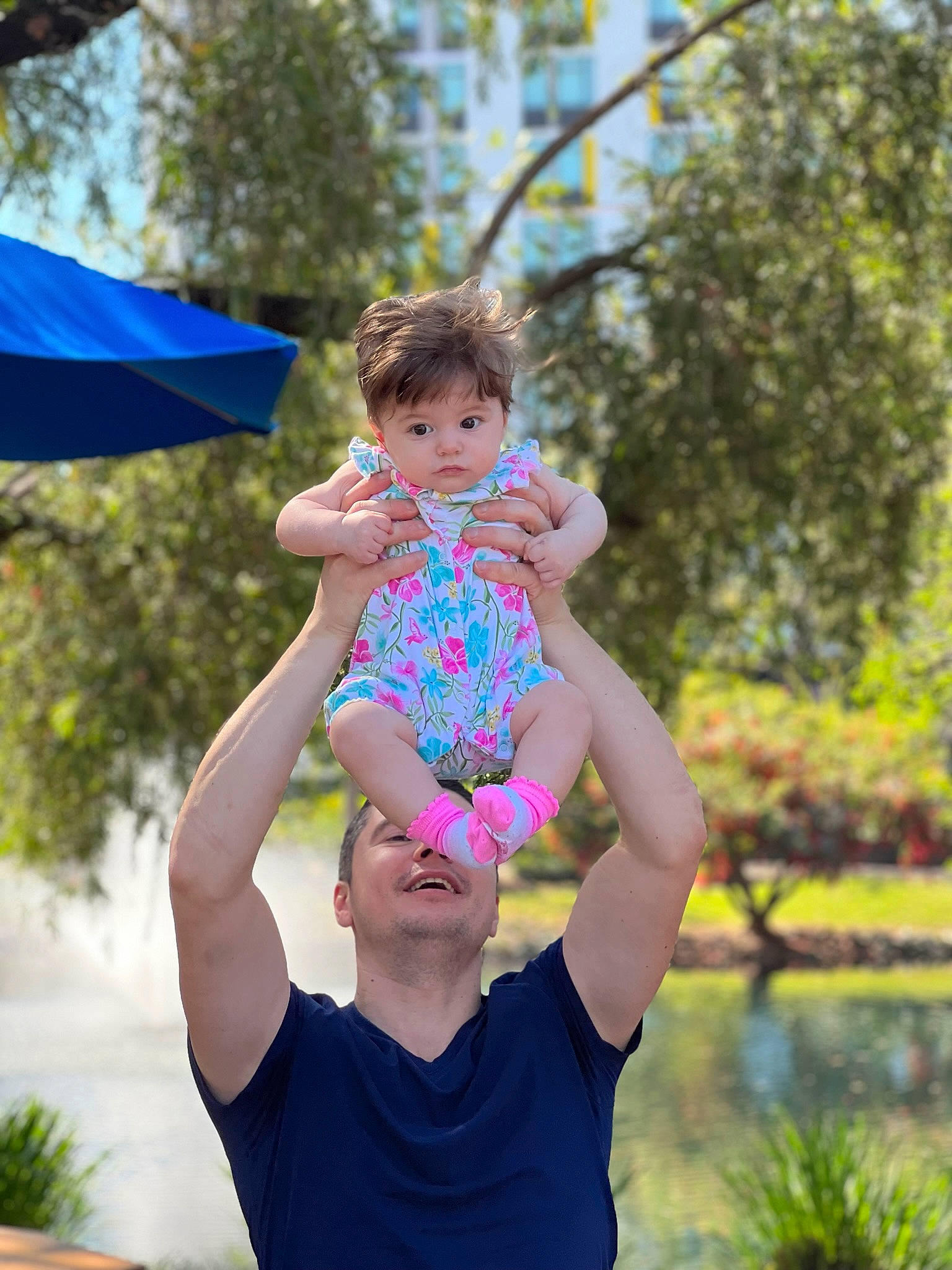 Luna joined the competition — help win amazing prizes! abdomen, baby, baby_toddler_clothing, electric_blue, fun, gesture, grass, hand, happy, leisure, people, people_in_nature, person, plant, recreation, summer, swimwear, t_shirt, toddler, tree