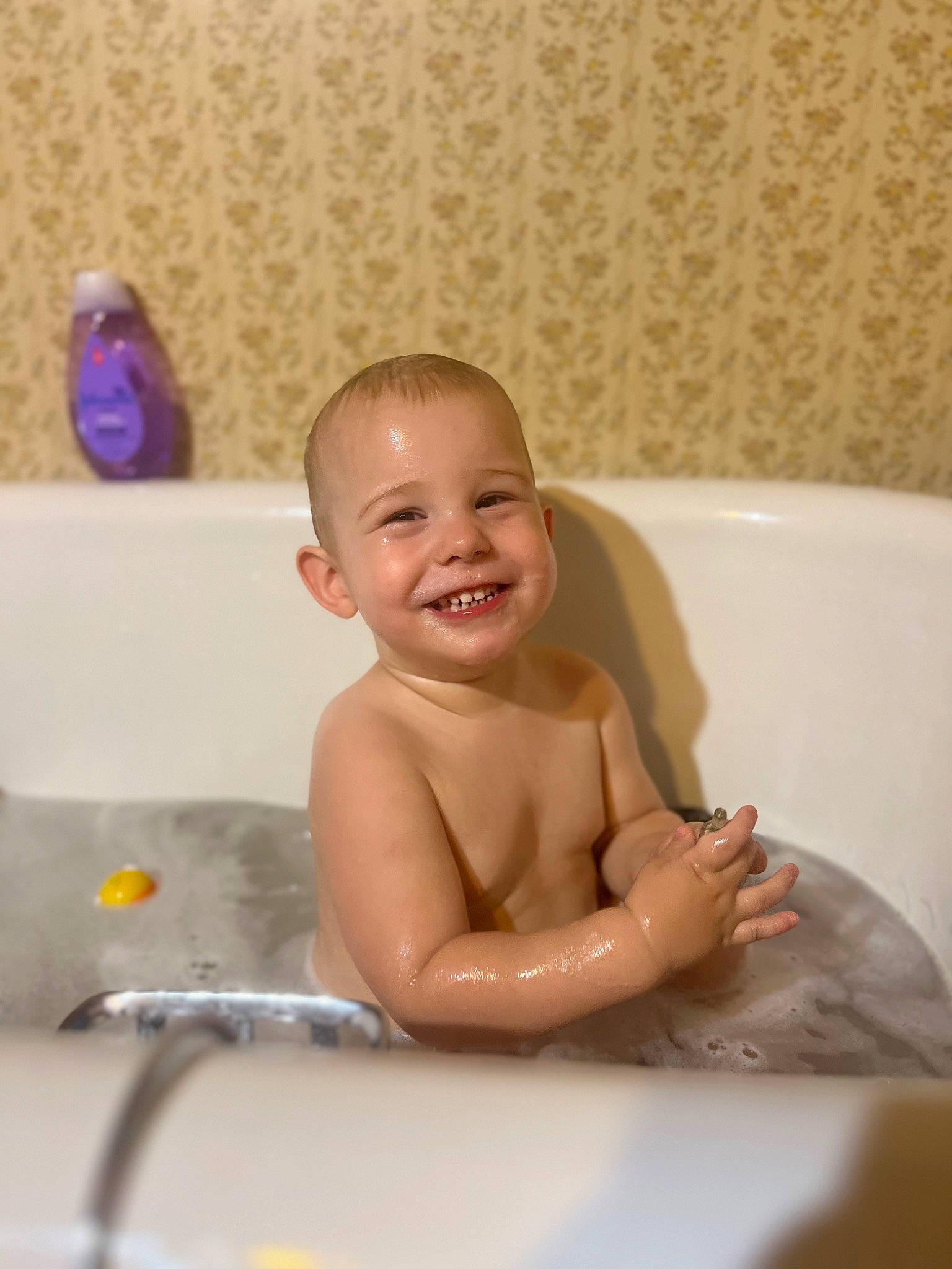 Jonah joined the competition — help win amazing prizes! baby, baby_bathing, bath_toy, bathing, bathroom, bathtub, bathtub_spout, child, composite_material, fluid, fun, happy, joy, person, personal_care, plumbing, plumbing_fixture, room, skin, smile