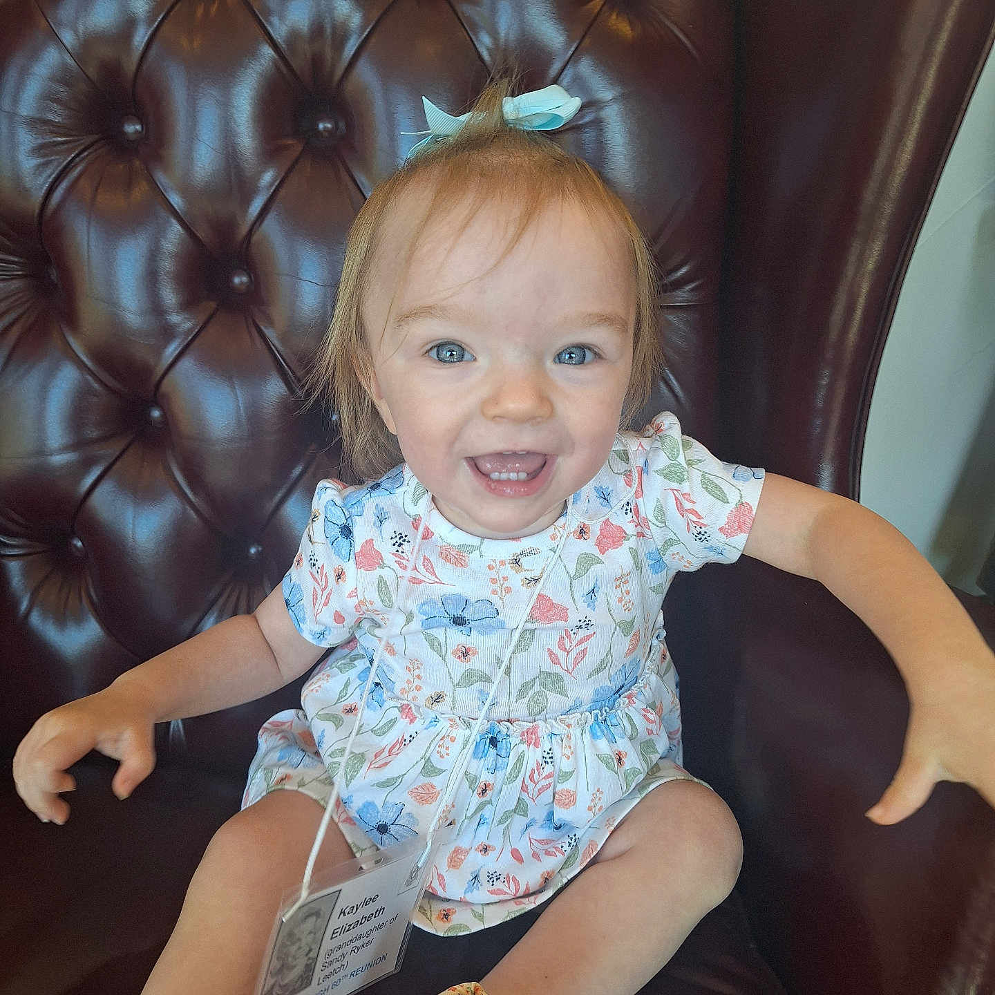 Kaylee joined the competition — help win amazing prizes! armchair, baby, bodypart, chair, clothing, couch, cushion, face, finger, furniture, hand, happy, head, homedecor, person, photography, portrait, sitting, t_shirt, text