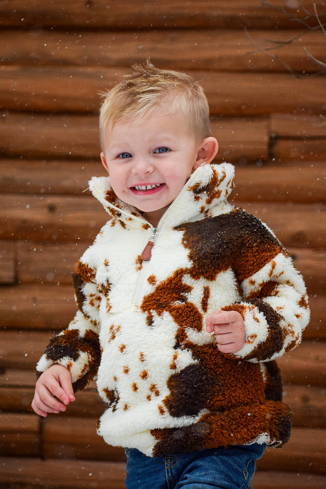 Brantley joined the competition — help win amazing prizes! baby_toddler_clothing, fawn, fun, fur_clothing, hair, happy, human_body, insect, iris, jeans, joy, outerwear, person, plant, pollinator, skin, sleeve, smile, standing, toddler