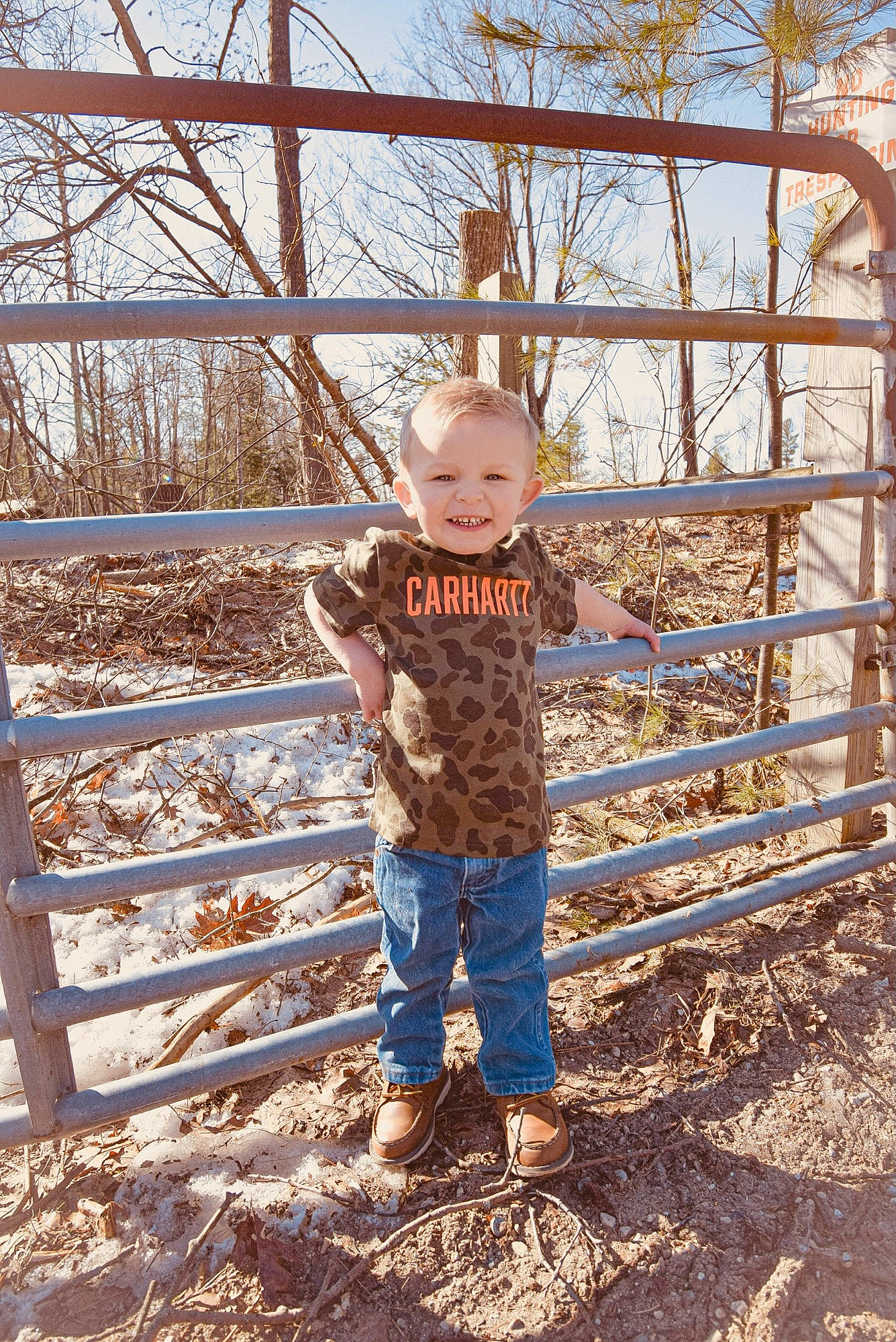 Brantley is registered to the contest to win money with this photo: baby_toddler_clothing, child, denim, fun, grass, happy, joy, landscape, leg, leisure, people, people_in_nature, person, sky, smile, soil, standing, symmetry, t_shirt, toddler