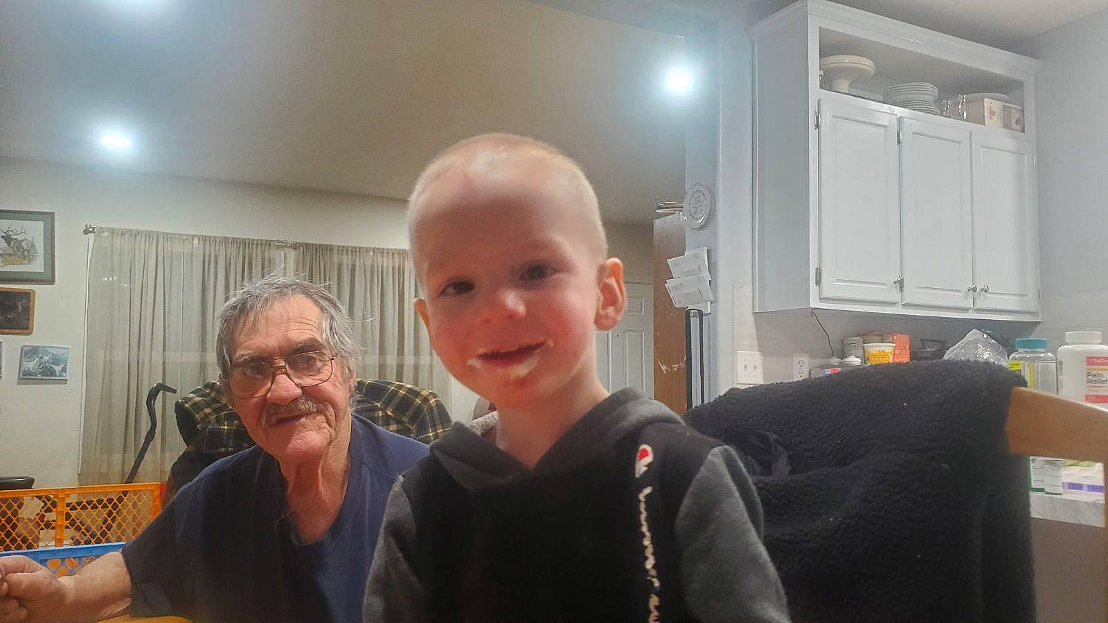 Gage joined the competition — help win amazing prizes! ceiling, chair, child, crew_cut, event, eyewear, fun, happy, joy, person, room, sitting, smile, t_shirt, tableware, toddler, vacation