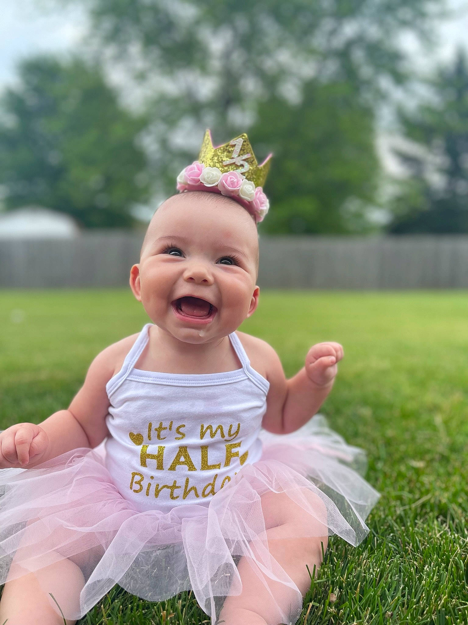 Kylah joined the competition — help win amazing prizes! baby, baby_toddler_clothing, child, costume_hat, crown, event, flash_photography, fun, gesture, grass, happy, headband, headgear, headpiece, person, pink, plant, recreation, smile, toddler