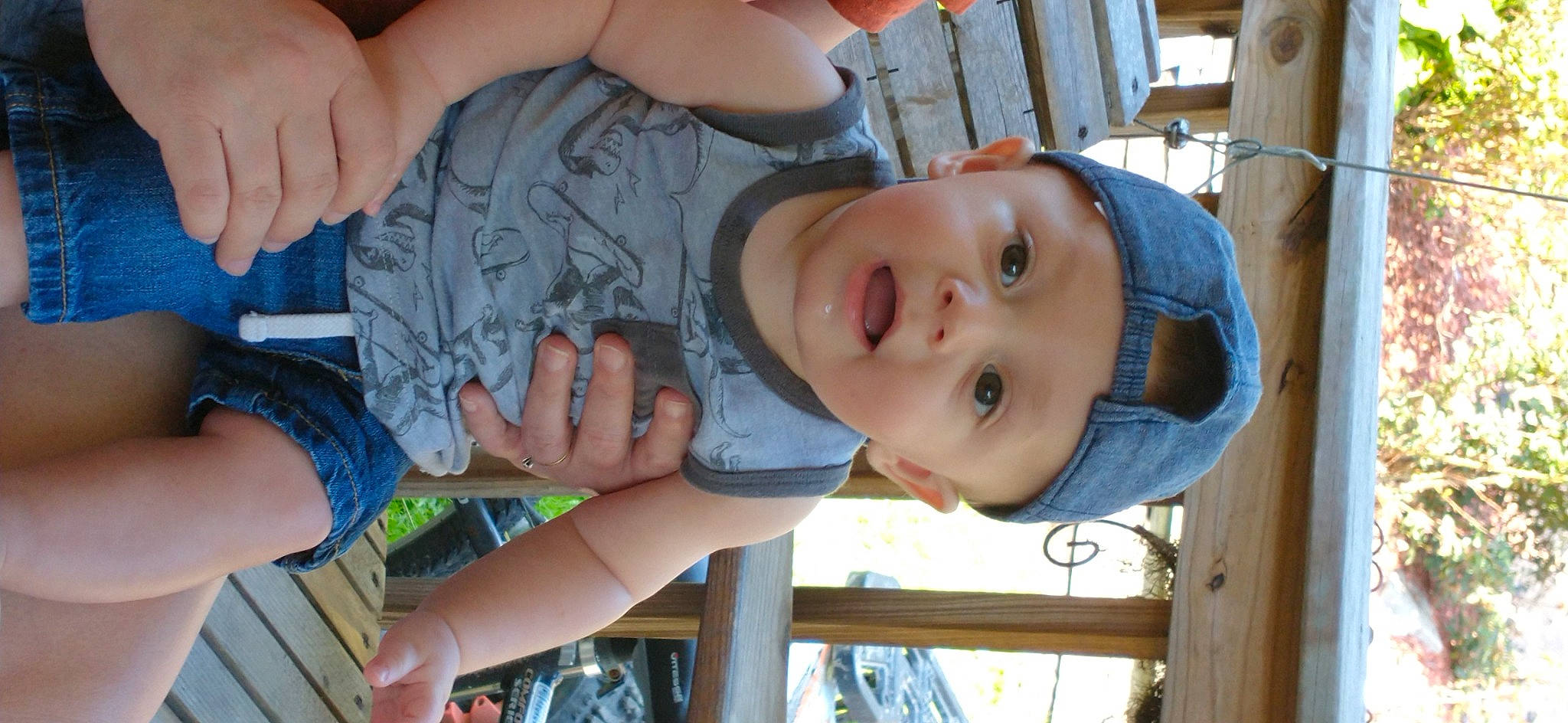 Kohen is registered to the contest to win money with this photo: baby, baby_toddler_clothing, cheek, chest, child, eye, eyelash, finger, fun, gesture, happy, headwear, human_body, iris, mouth, nose, person, skin, sleeve, smile