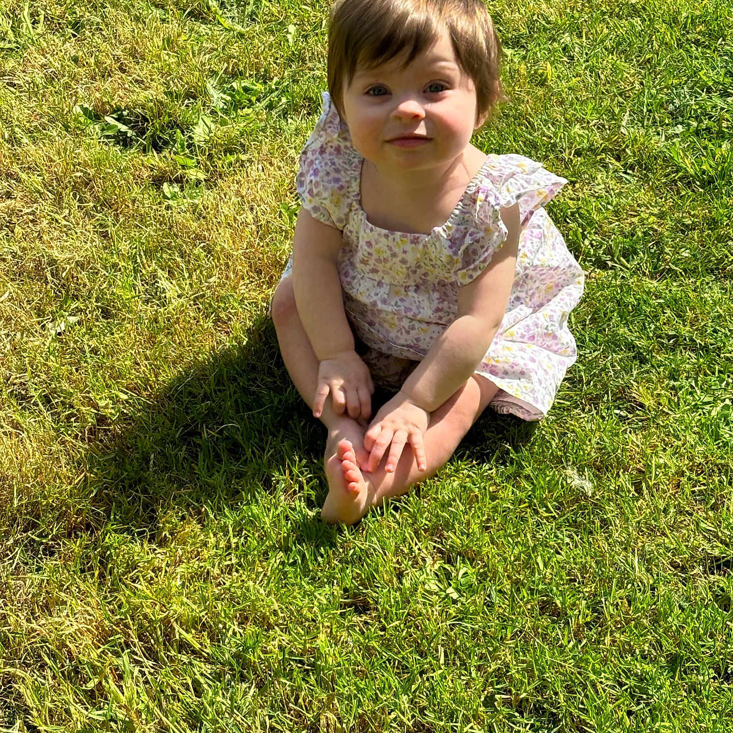 Tegan-Rose is registered to the contest to win money with this photo: baby, backyard, clothing, dress, face, field, grass, grassland, head, lawn, nature, outdoors, park, person, photography, plant, portrait, sitting, summer, yard