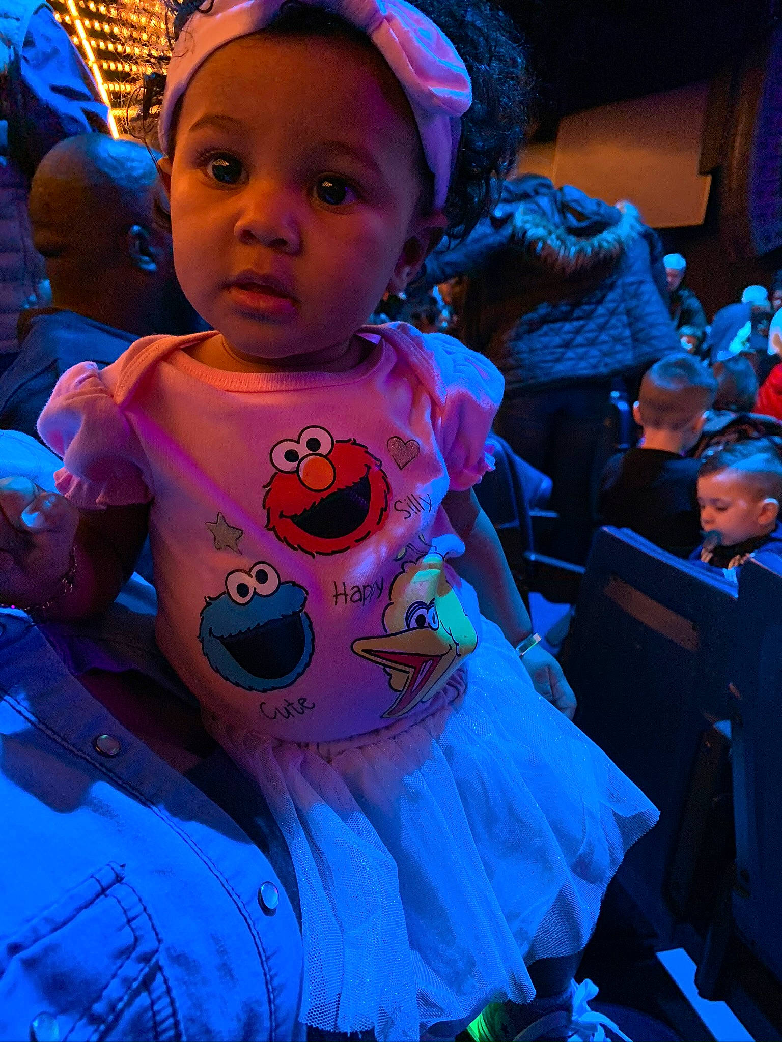 Riley is registered to the contest to win money with this photo: blue, child, costume, electric_blue, person, pink, purple, smile, toddler, under_exposed, world