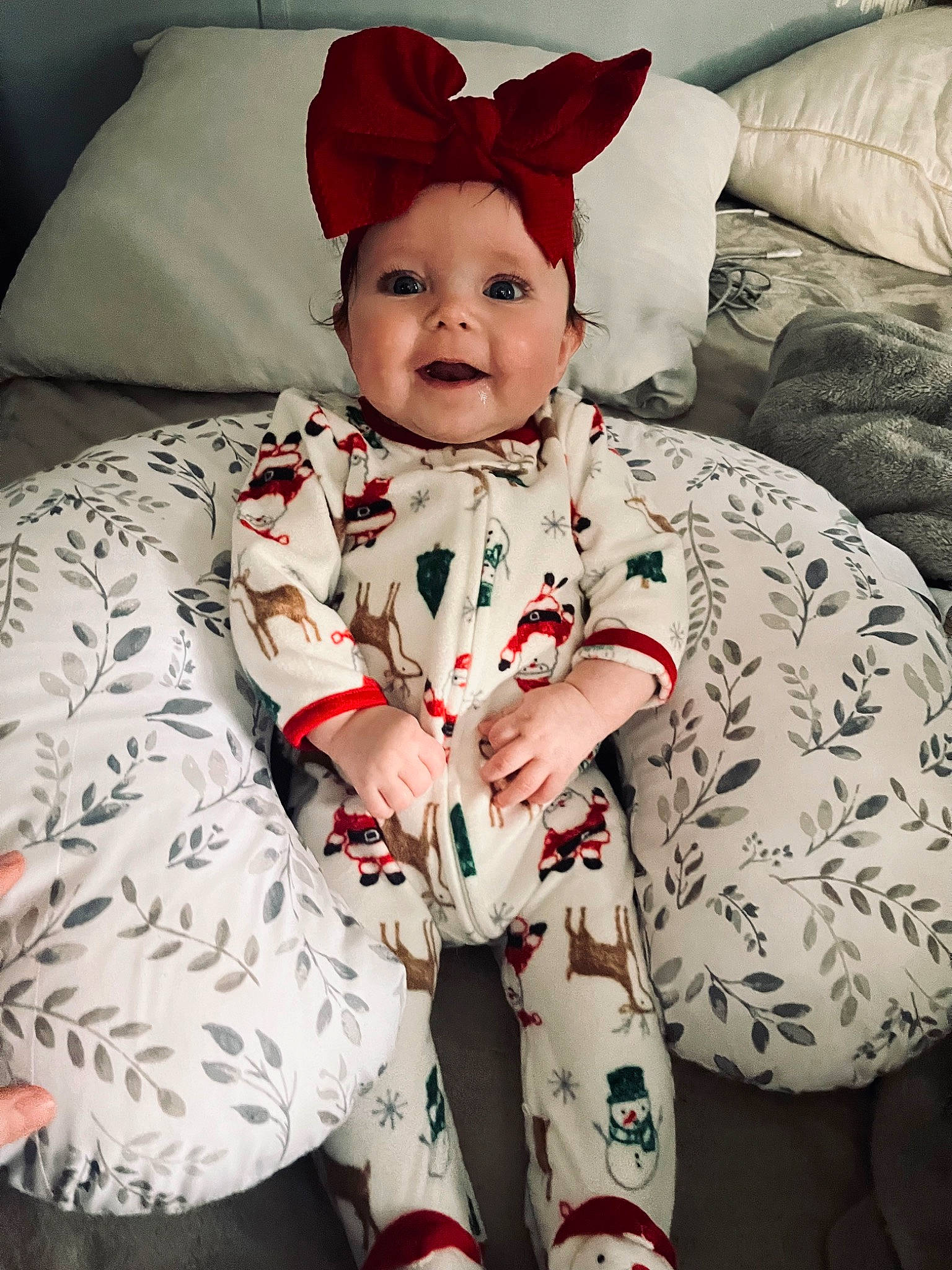 Indie is registered to the contest to win money with this photo: baby, baby_toddler_clothing, child, collar, comfort, couch, dress, eye, face, facial_expression, hairstyle, happy, head, human_body, pattern, person, sitting, sleeve, smile, toddler