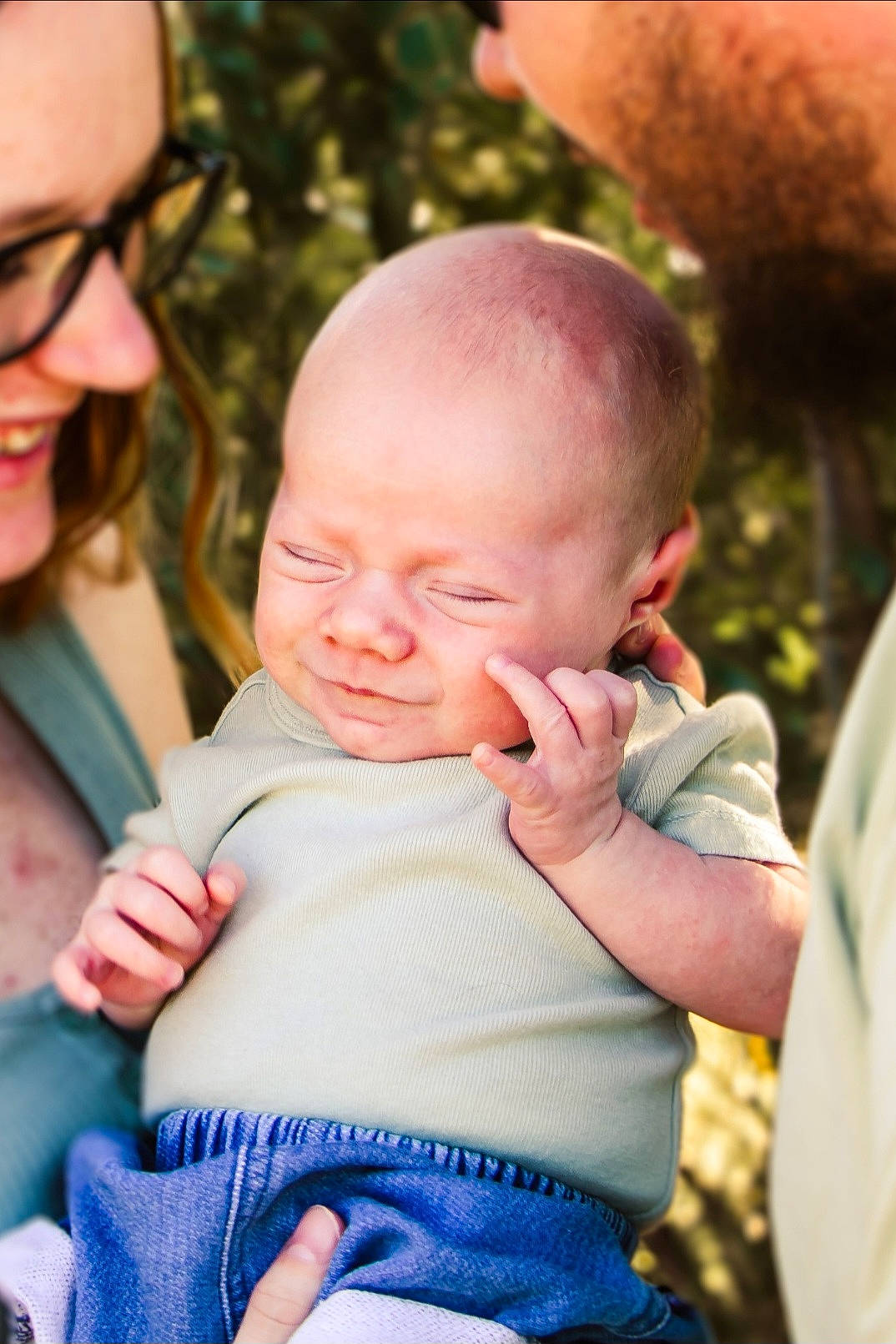 George is registered to the contest to win money with this photo: baby, baby_toddler_clothing, cheek, child, event, facial_expression, finger, fun, grass, happy, head, iris, leisure, people, people_in_nature, person, pink, skin, smile, toddler