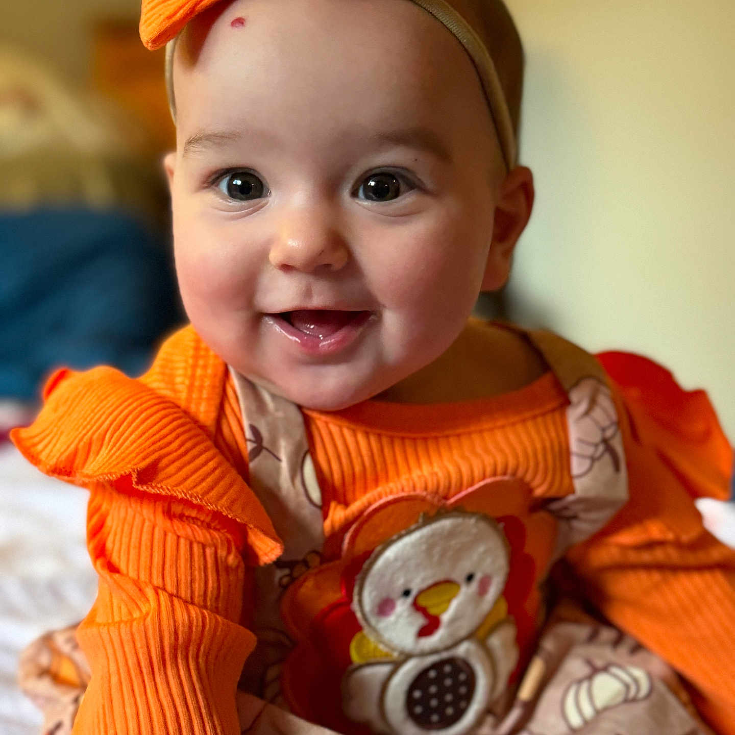 Amira joined the competition — help win amazing prizes! applique, baby, bodypart, clothing, couch, dress, face, finger, formalwear, furniture, hand, happy, head, knitwear, pattern, person, photography, portrait, smile, sweater