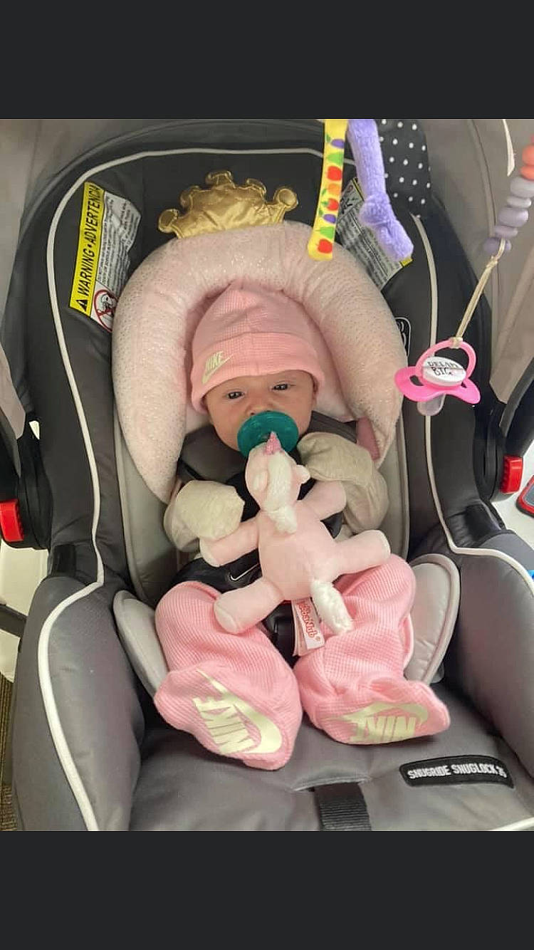 Delilah joined the competition — help win amazing prizes! auto_part, baby_carriage, baby_products, baby_toys, car_seat, car_seat_cover, carmine, comfort, doll, event, fun, head, headwear, lap, person, pink, plush, seat_belt, steering_wheel, stuffed_toy