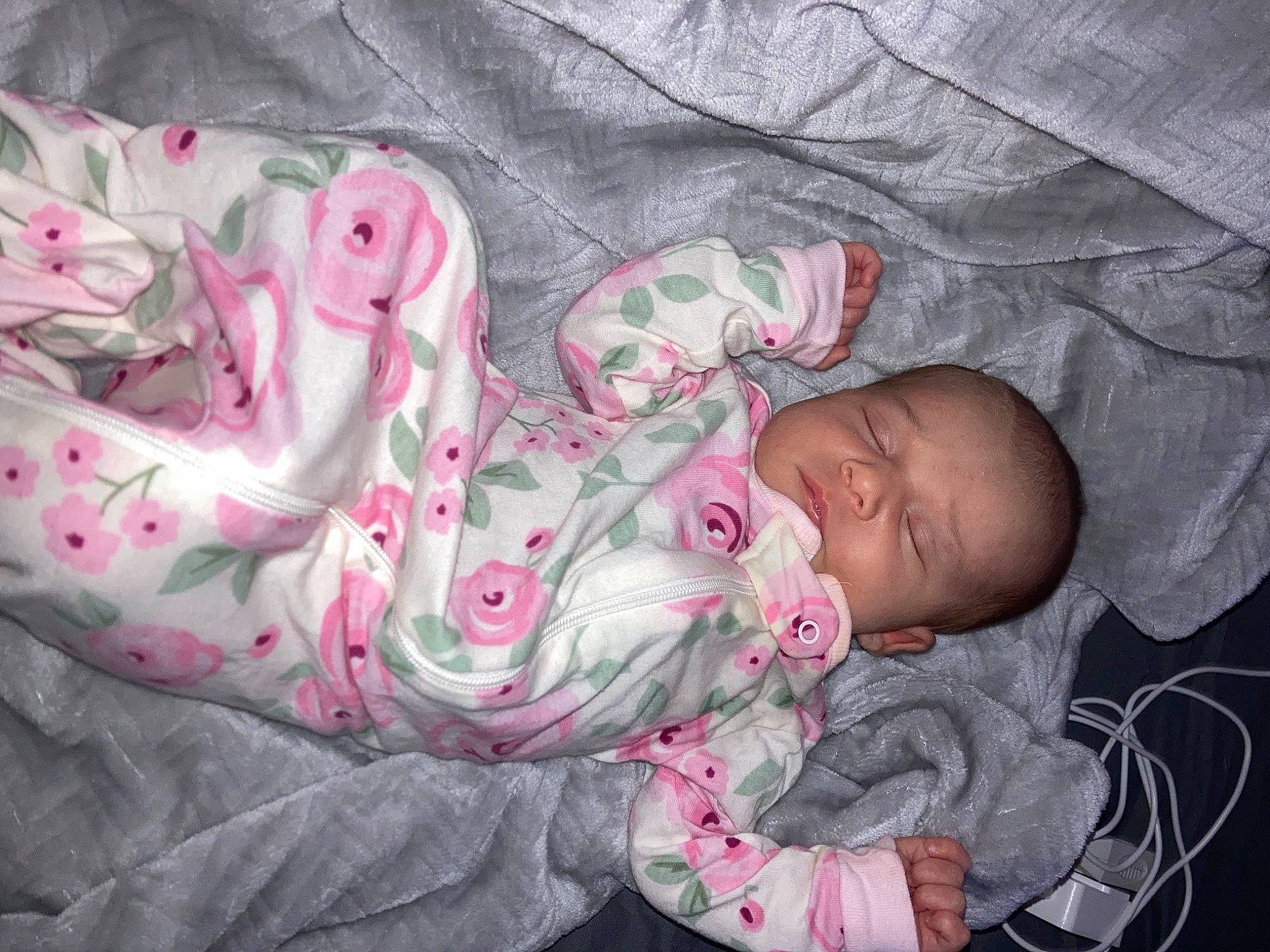 Delilah is registered to the contest to win money with this photo: arm, baby, baby_carriage, baby_products, baby_sleeping, baby_toddler_clothing, bedtime, carmine, cheek, child, comfort, face, linens, mouth, nap, pattern, person, pink, skin, sleeve