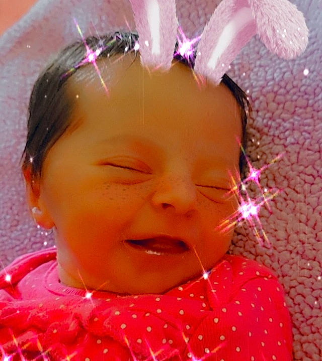 Kimber is registered to the contest to win money with this photo: baby, cheek, chin, ear, eye, eyebrow, eyelash, face, facial_expression, fun, hair, happy, head, iris, lip, nose, person, pink, skin, smile