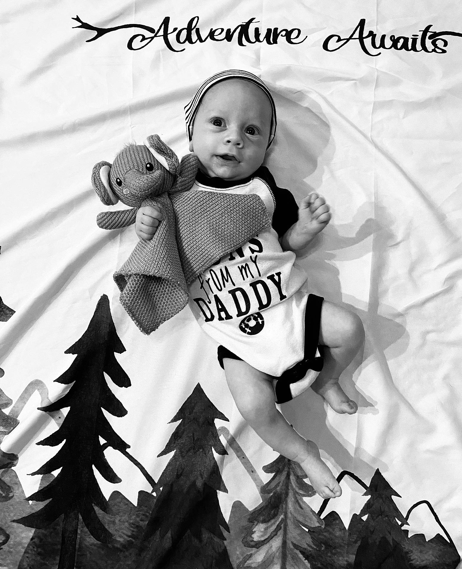 Nathaniel joined the competition — help win amazing prizes! baby, blanket, bodypart, bonnet, clothing, face, finger, hand, hat, head, leaf, newborn, people, person, photography, plant, portrait, t_shirt, text, toy