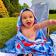 Alyan is registered to the contest to win money with this photo: baby, towel, smiling, outdoor, grass, blanket, happy, child, playful, barefoot, lawn, summer, portrait, young, cheerful, sitting, colorful, expression, nature, backyard