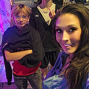 Carson Duplessis is registered to the contest to win money with this photo: arcade, selfie, three_people, young_boys, woman, smiling, neon_lights, gaming_machines, indoor, casual_clothing, glasses, jeans, hoodie, carpet, entertainment, fun, colorful, portrait, group, youth
