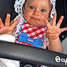 Summer participe au concours pour gagner de l'argent avec cette photo : baby, child, stroller, blue_eyes, red_and_white_dress, blue_bow, frilly_bonnet, cute, hands_up, playful, smiling, infant, white_socks, car_seat, portrait, closeup, person, indoor, fashion, baby_clothing
