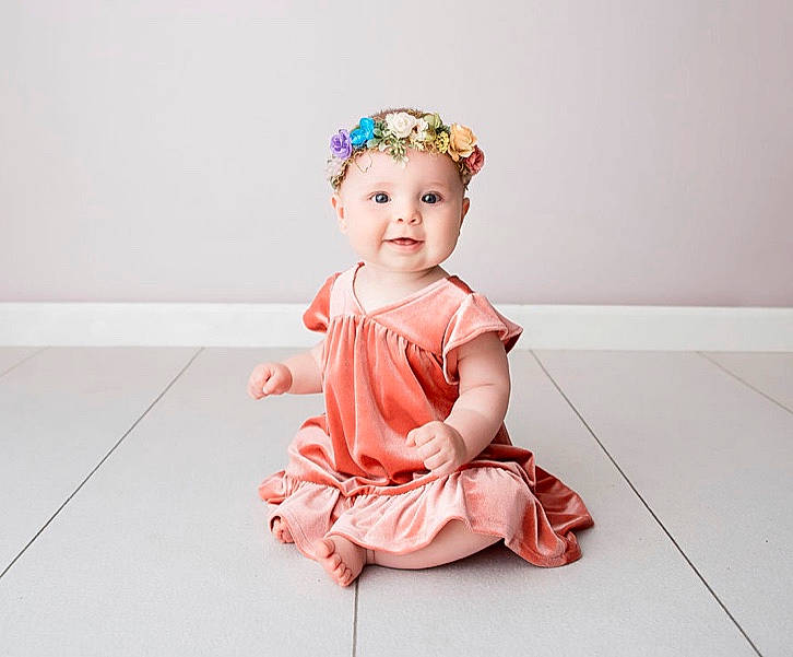 Ava joined the competition — help win amazing prizes! baby, child, child_model, costume, crown, fashion_accessory, hair_accessory, headband, headgear, headpiece, peach, person, photography, pink, sitting, sleeve, textile, toddler
