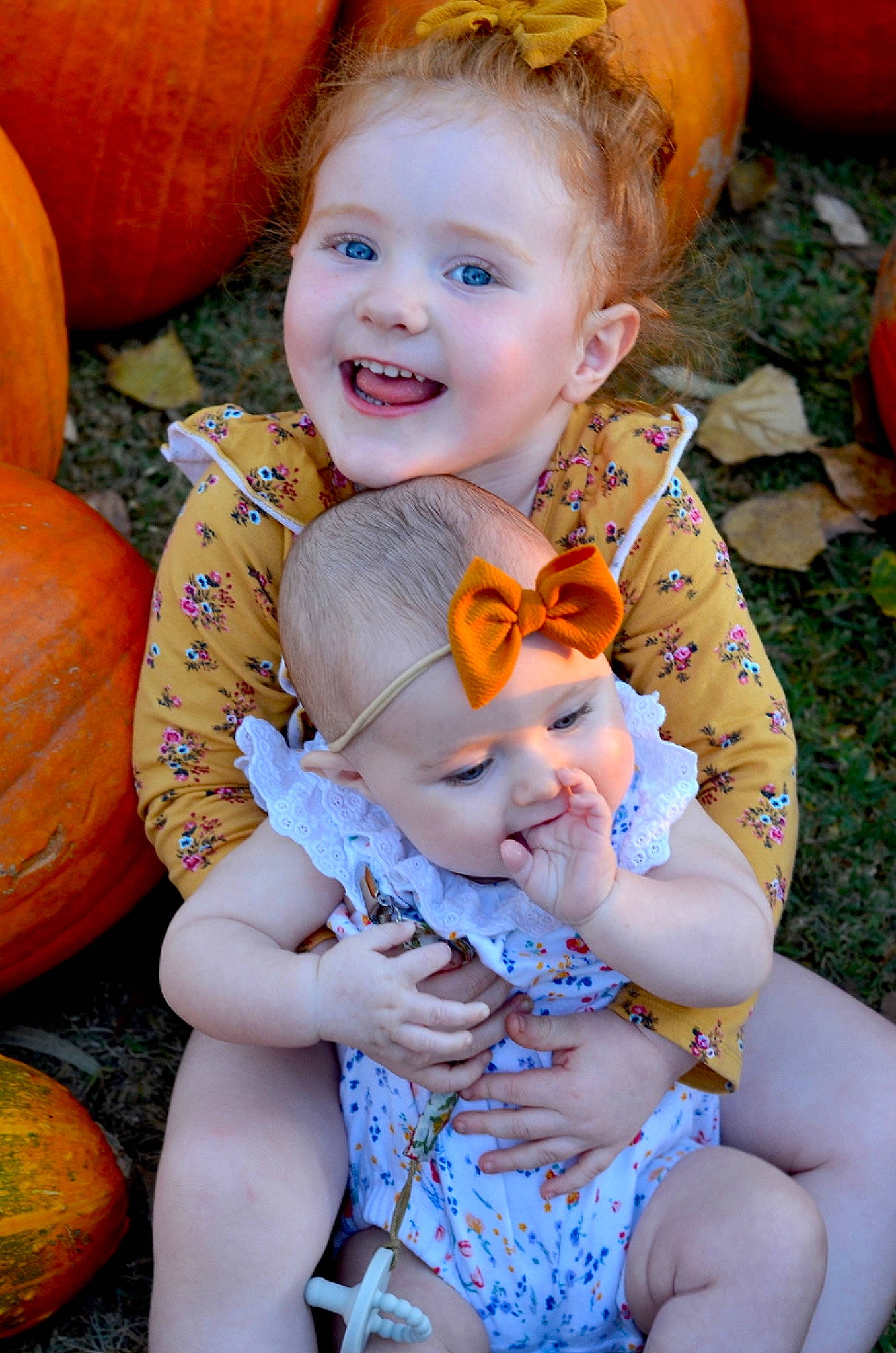 Bryer joined the competition — help win amazing prizes! baby, calabaza, cheek, child, face, family, fruit, fun, iris, joy, orange, person, plant, pumpkin, sitting, skin, smile, toddler, winter_squash, yellow