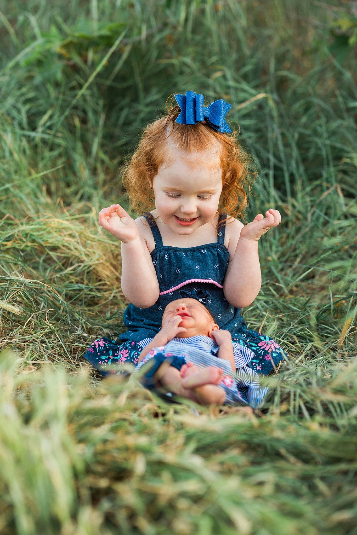 Bryer joined the competition — help win amazing prizes! baby, child, child_model, eye, fun, grass, grass_family, grassland, happy, joy, leaf, long_hair, meadow, people_in_nature, person, photograph, photography, plant, sitting, spring