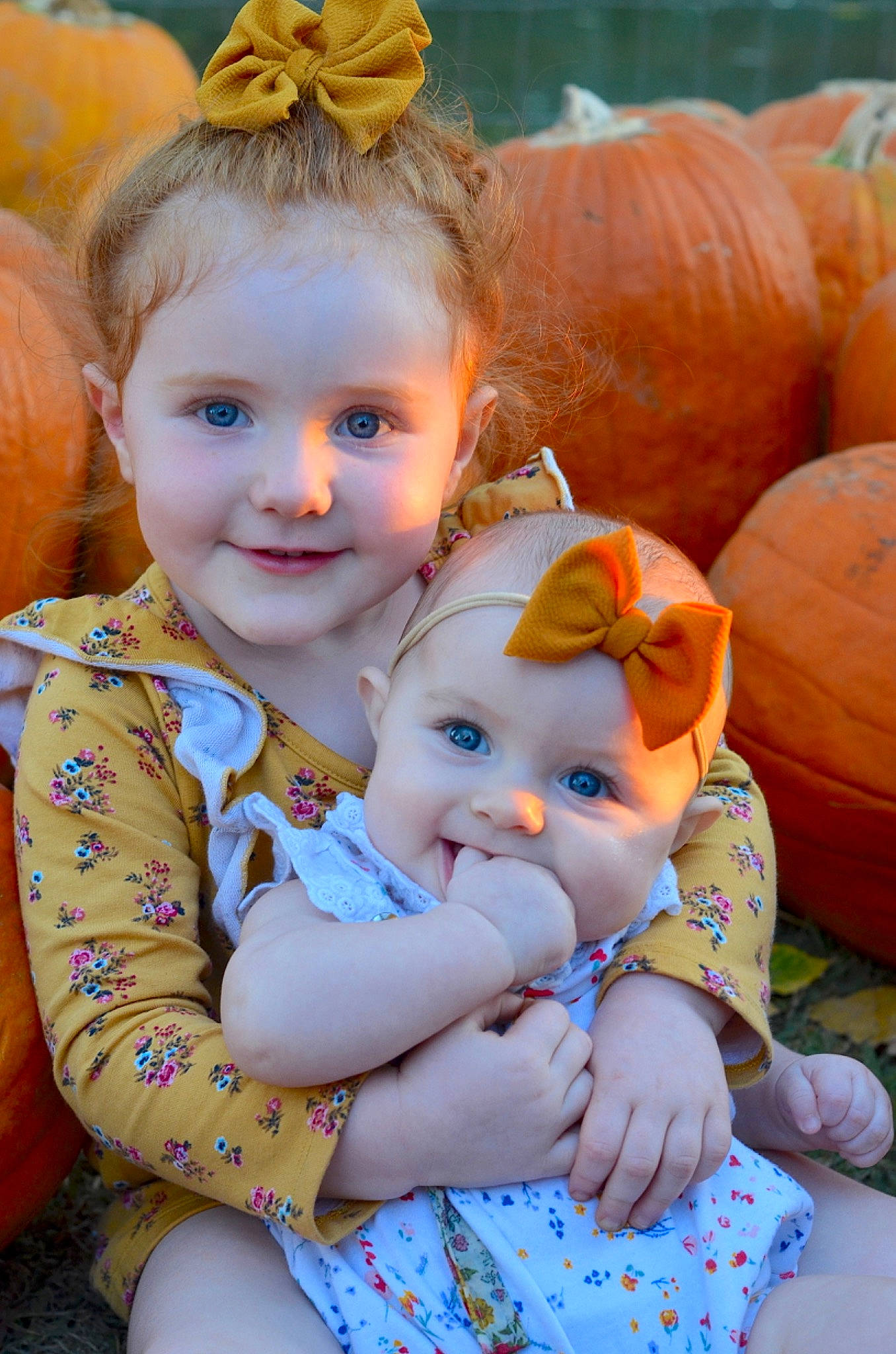 Raelyn joined the competition — help win amazing prizes! baby, cheek, child, iris, joy, person, pumpkin, smile, stuffed_toy, toddler
