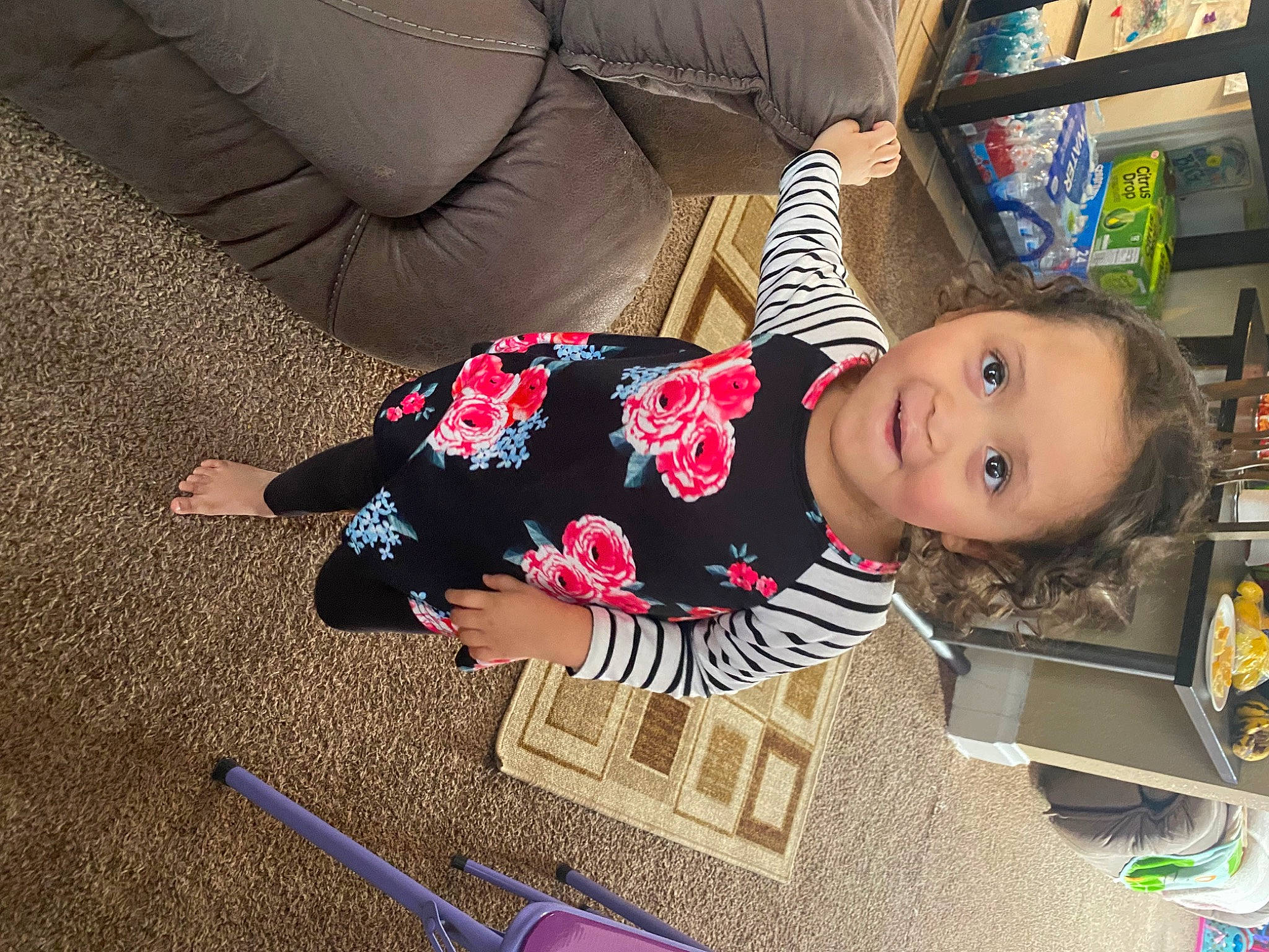 Daisey is registered to the contest to win money with this photo: baby, baby_toddler_clothing, bookcase, child, comfort, cutlery, flooring, fun, kitchen_utensil, office_supplies, pen, person, play, room, shelf, sleeve, smile, toddler, writing_implement