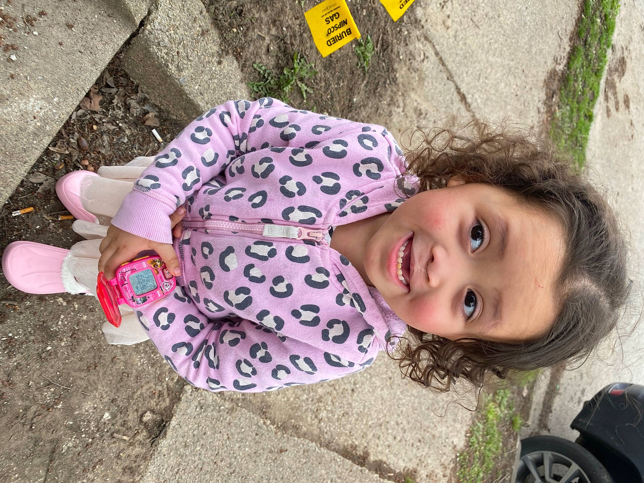 Daisey joined the competition — help win amazing prizes! asphalt, child, city, cool, fun, grass, happy, joy, leaf, leisure, lip, pattern, person, pink, plant, road_surface, sitting, smile, summer, toddler