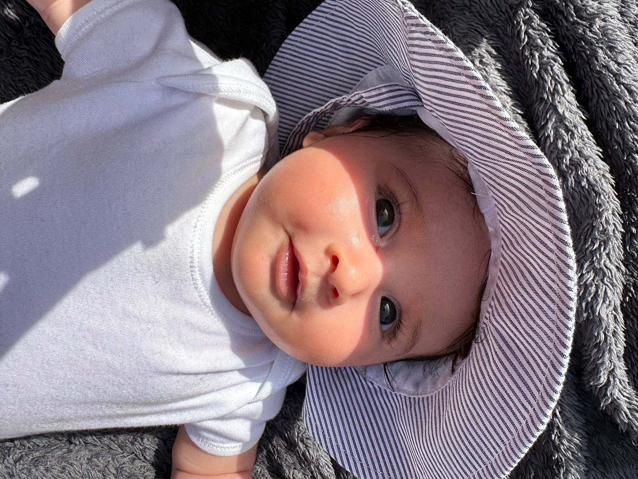Amirah joined the competition — help win amazing prizes! baby, baby_toddler_clothing, cheek, close_up, comfort, eyebrow, eyelash, flash_photography, fun, grass, happy, headgear, headwear, iris, lip, nose, person, skin, smile, toddler