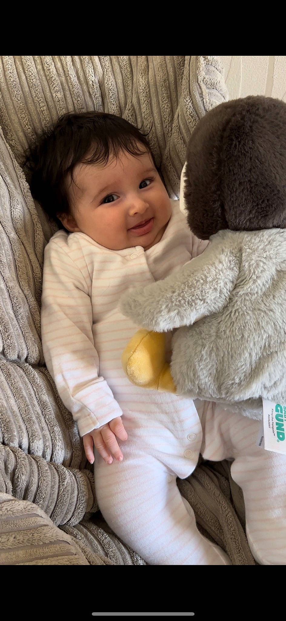 Amirah joined the competition — help win amazing prizes! baby, baby_toddler_clothing, cheek, child, comfort, facial_expression, fur, gesture, head, joy, linens, nose, outerwear, person, product, skin, sleeve, stuffed_toy, textile, toddler