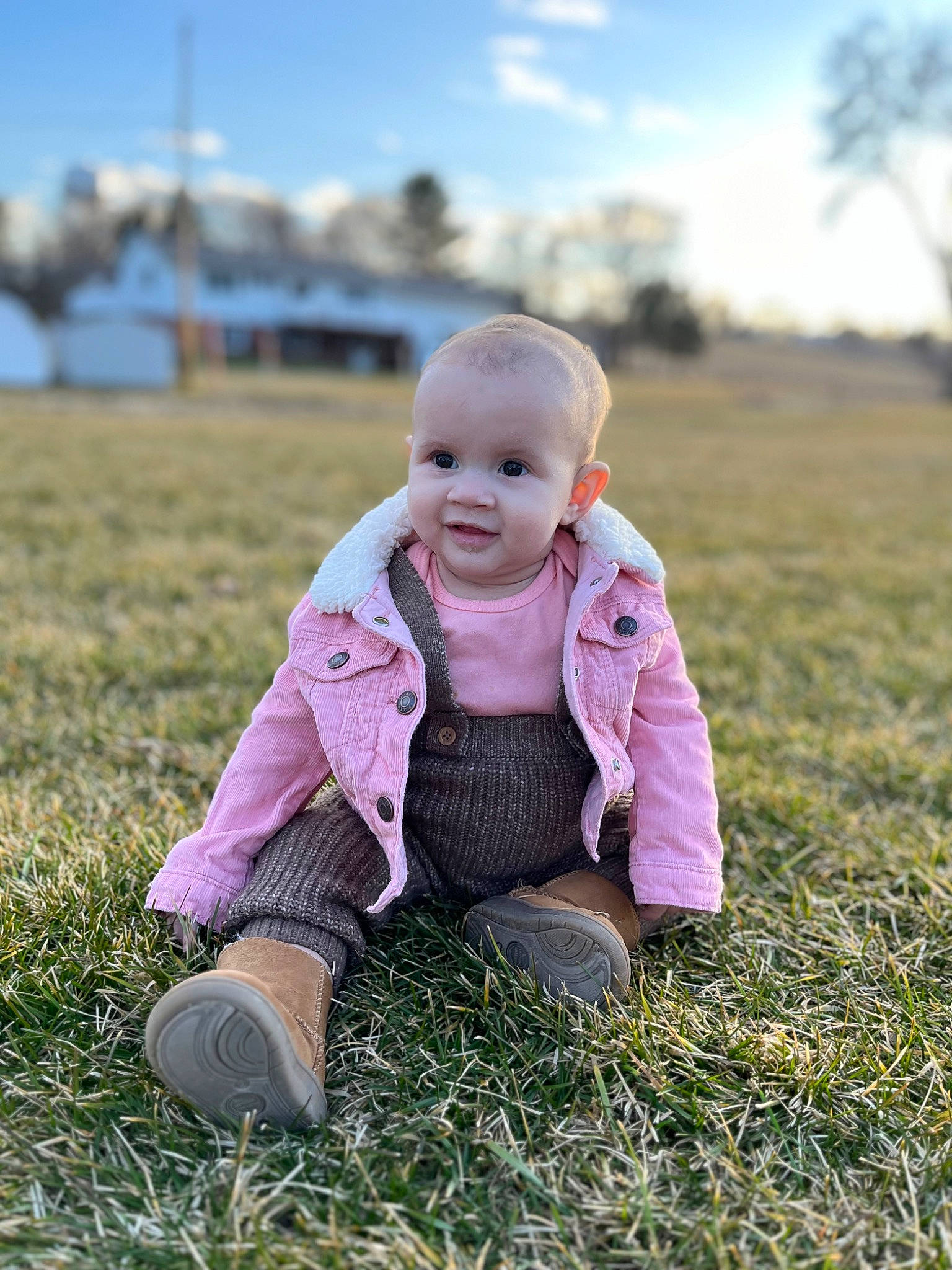 Raelynn joined the competition — help win amazing prizes! baby, baby_toddler_clothing, child, cloud, field, grass, grass_family, grassland, happy, jacket, landscape, meadow, people_in_nature, person, plant, prairie, pumpkin, sitting, sky, toddler