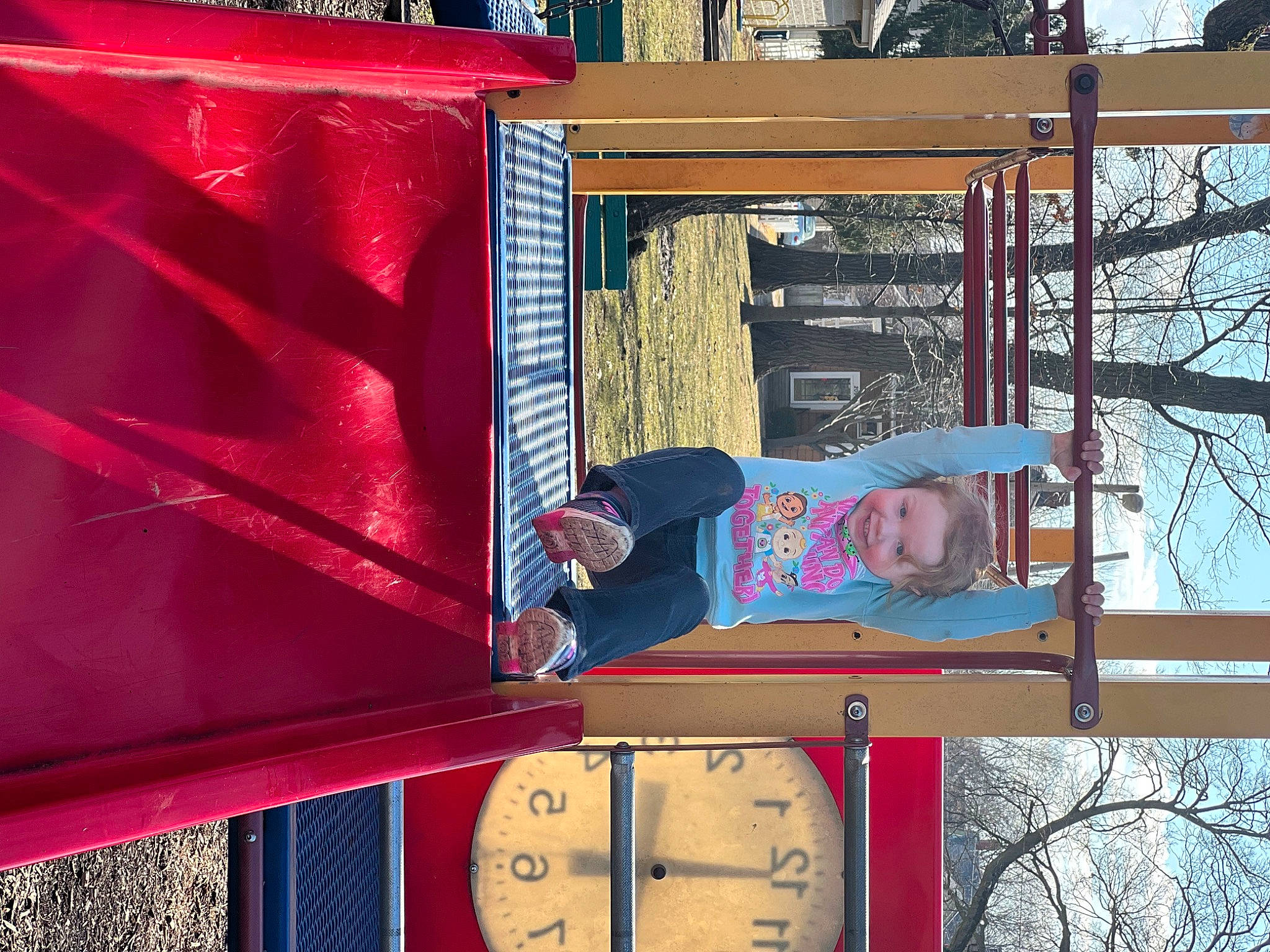 Tayah is registered to the contest to win money with this photo: advertising, carmine, city, clock, design, electric_blue, facade, fun, hat, joy, leisure, line, magenta, metal, person, red, sky, smile, t_shirt, textile