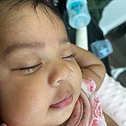Amira joined the competition — help win amazing prizes! baby, sleeping, close_up, face, child, pink_clothing, infant, peaceful, portrait, cute, soft_light, young_child, skin, eyelashes, indoors, resting, peace, human, adorable, gentle