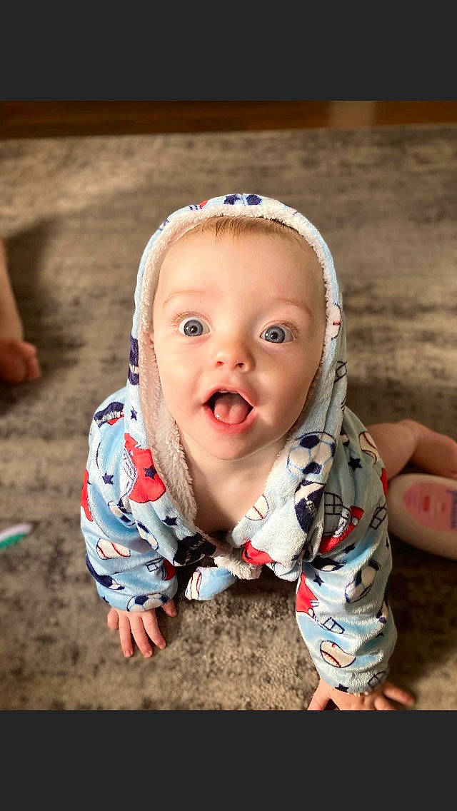 Kashton joined the competition — help win amazing prizes! baby, baby_toddler_clothing, cheek, child, chin, crawling, eye, flash_photography, flooring, fun, grass, happy, iris, lip, nose, person, sitting, sleeve, smile, surprise