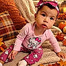 baby, child, infant, sitting, portrait, smiling, autumn, fall, pumpkin, leaves, blanket, couch, pillow, bow_headband, pink_clothing, hello_kitty, indoor, cozy, home_decor, photography