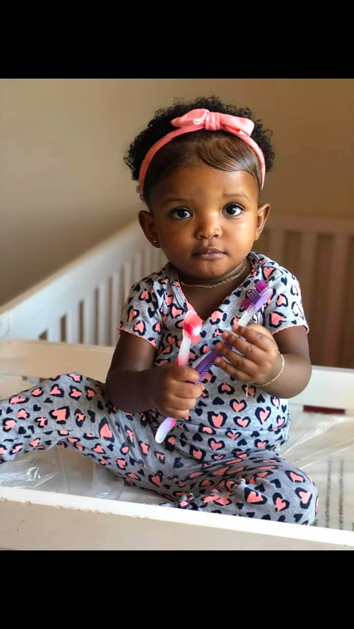 Melani is registered to the contest to win money with this photo: baby, baby_toddler_clothing, cheek, child, child_model, fashion_accessory, hair_accessory, hairstyle, headband, headgear, person, skin, smile, toddler