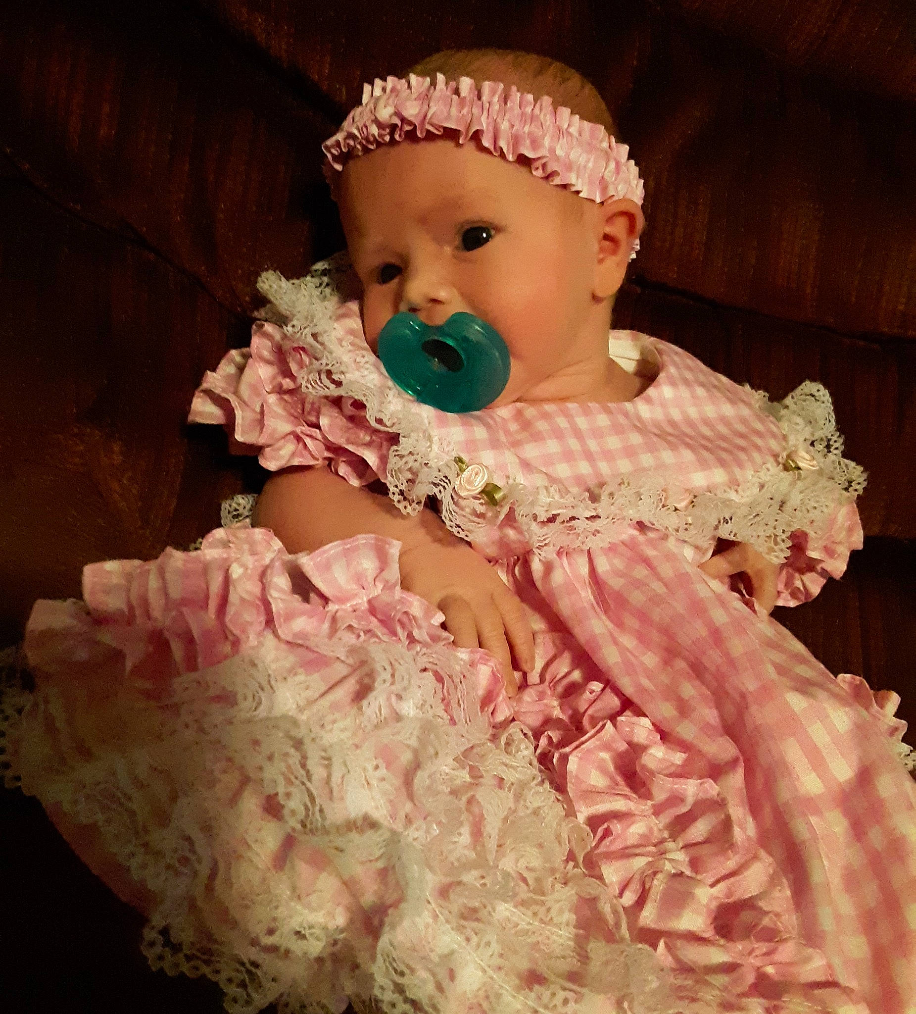 Kyndall is registered to the contest to win money with this photo: baby, child, dress, embellishment, hair_accessory, headgear, headwear, lace, person, pink, ruffle, textile, toddler