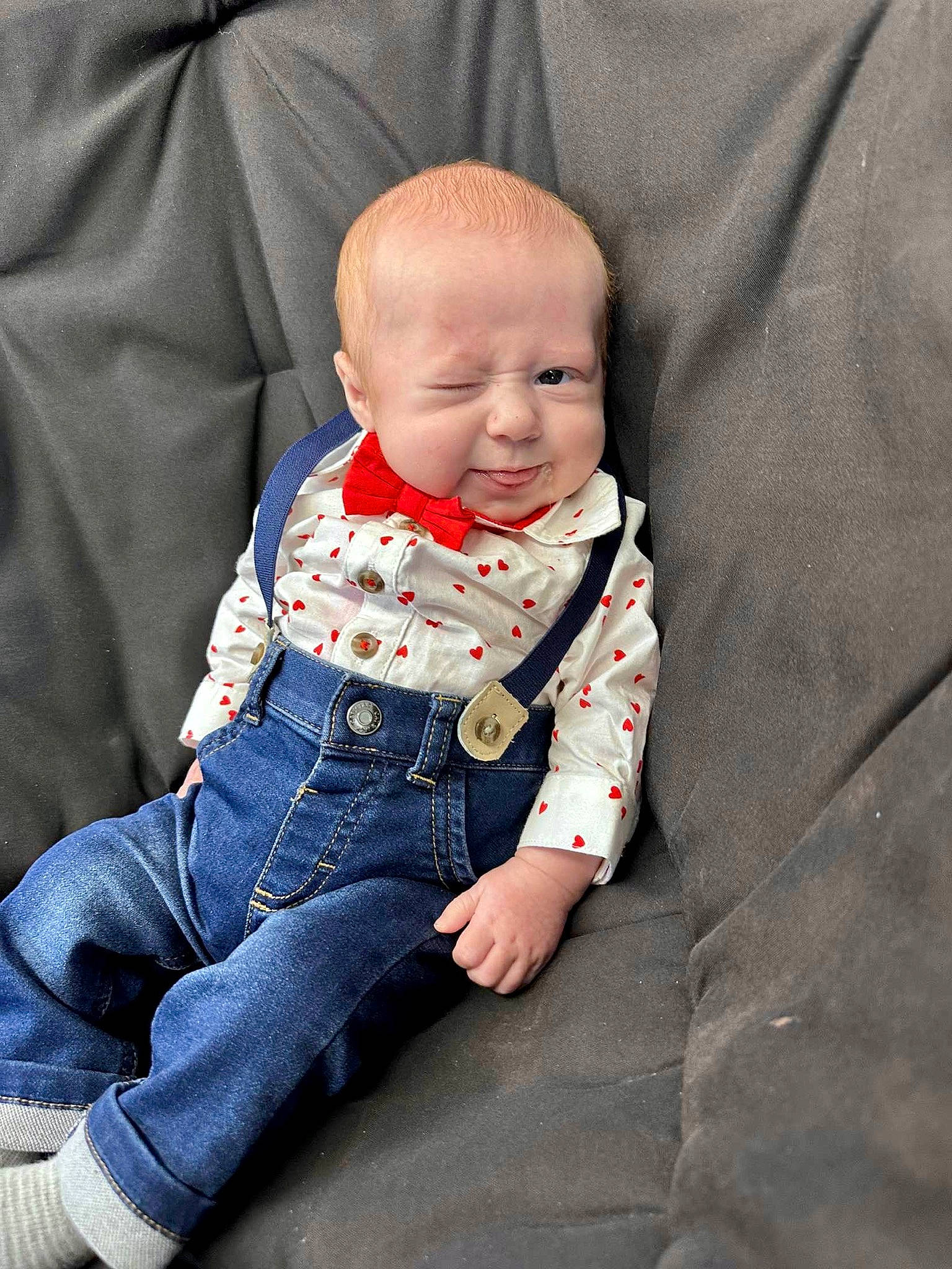 Emmerson joined the competition — help win amazing prizes! baby, baby_toddler_clothing, cheek, collar, comfort, denim, dress_shirt, grey, human_body, jeans, linens, outerwear, pattern, person, sitting, skin, sleeve, t_shirt, textile, toddler
