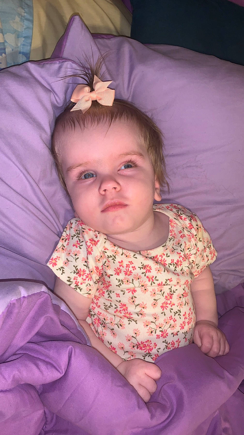 Raelynn is registered to the contest to win money with this photo: cheek, chin, comfort, eye, eyebrow, eyelash, fun, hair, happy, head, human_body, iris, lip, mouth, nose, person, pink, purple, skin, textile