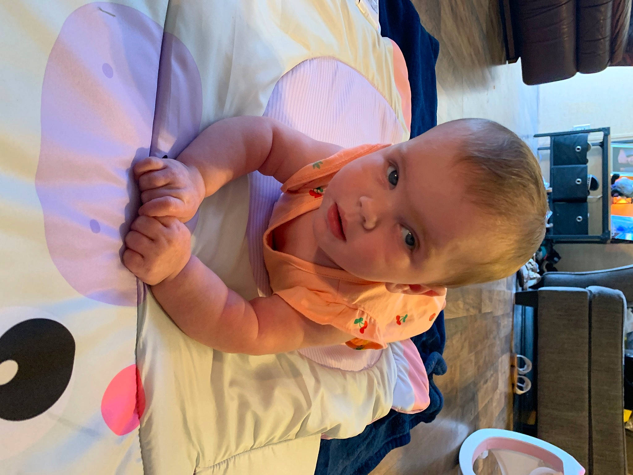 Raelynn is registered to the contest to win money with this photo: baby, baby_products, baby_toddler_clothing, child, curtain, ear, event, finger, fun, gesture, hand, happy, leisure, mouth, person, sitting, skin, smile, thumb, toddler