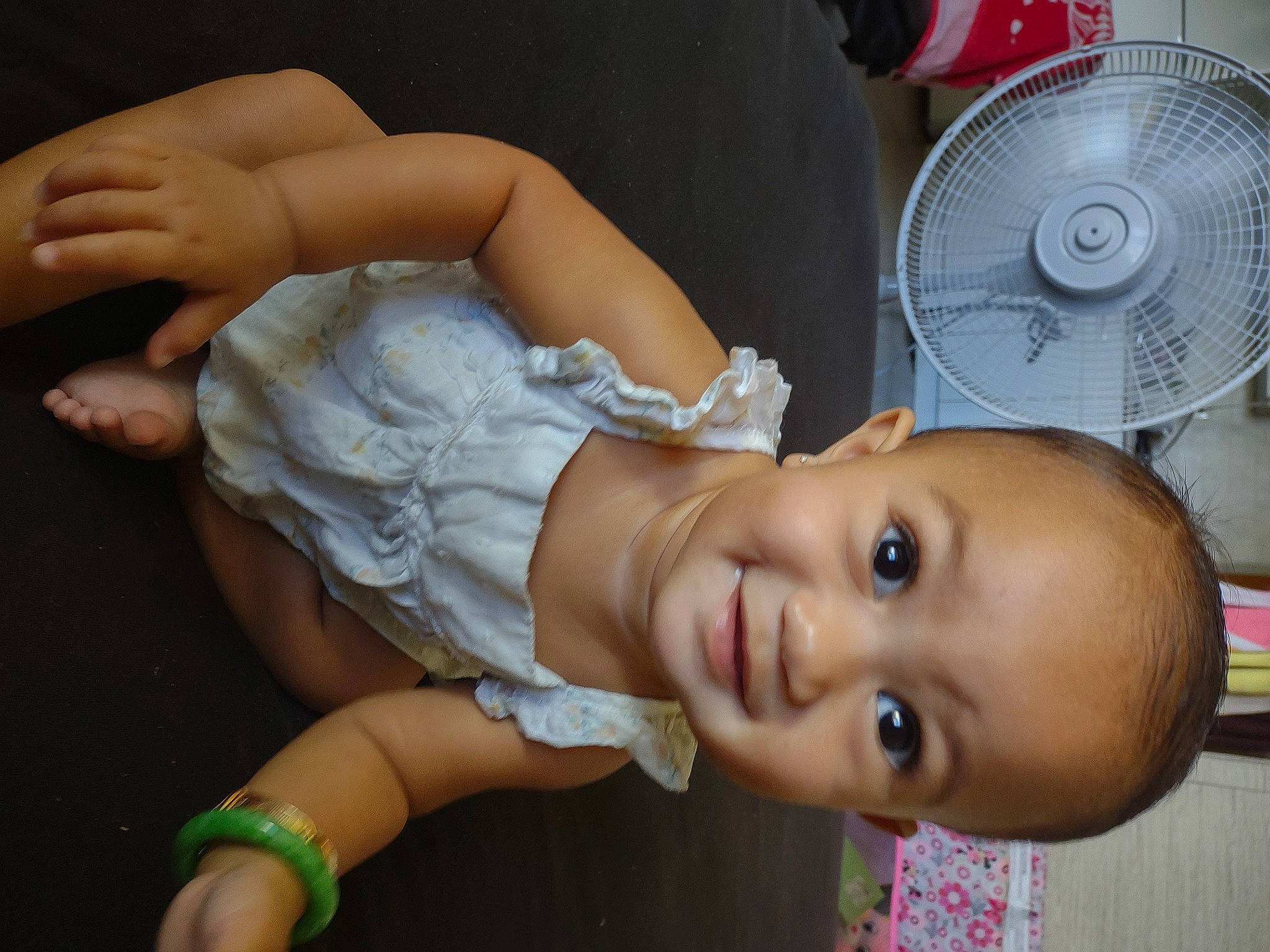 Ku'Uleinani is registered to the contest to win money with this photo: automotive_tire, baby, baby_toddler_clothing, cheek, chest, child, dress, eyelash, fun, happy, home_appliance, iris, joy, machine, mechanical_fan, mouth, nose, person, pink, skin