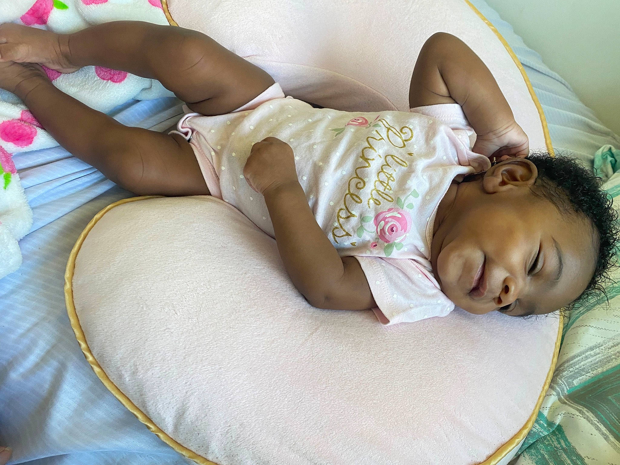 Iylani joined the competition — help win amazing prizes! abdomen, chest, child, comfort, couch, eyelash, finger, foot, hand, human_leg, knee, lap, leg, linens, person, sitting, skin, sunglasses, thigh, toddler