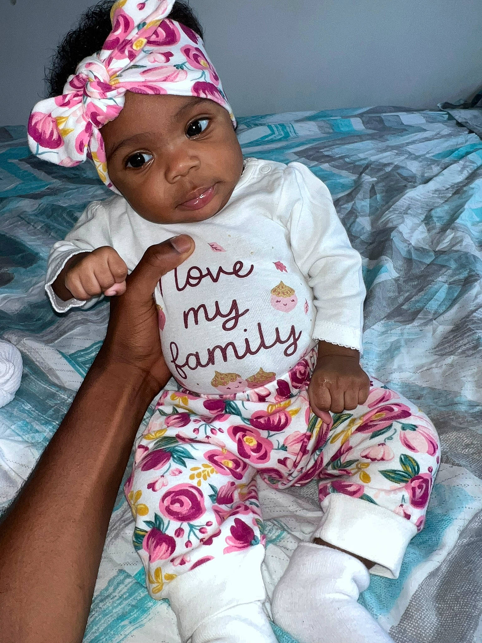 Iylani joined the competition — help win amazing prizes! arm, baby_toddler_clothing, cap, comfort, cool, costume_hat, face, facial_expression, hairstyle, happy, head, headwear, human, party_hat, person, pink, purple, skin, sleeve, textile