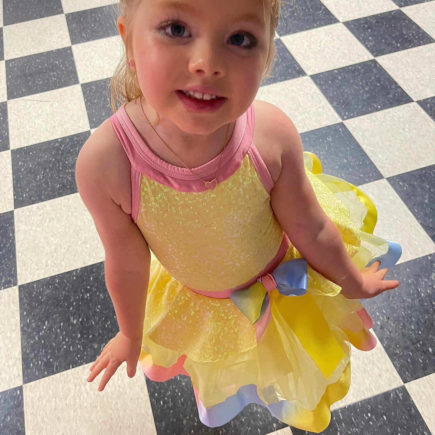 Parker joined the competition — help win amazing prizes! accessories, baby, bathroom, bodypart, clothing, dress, face, finger, hand, head, indoors, jewelry, necklace, person, photography, portrait, room, sitting, tile, toilet