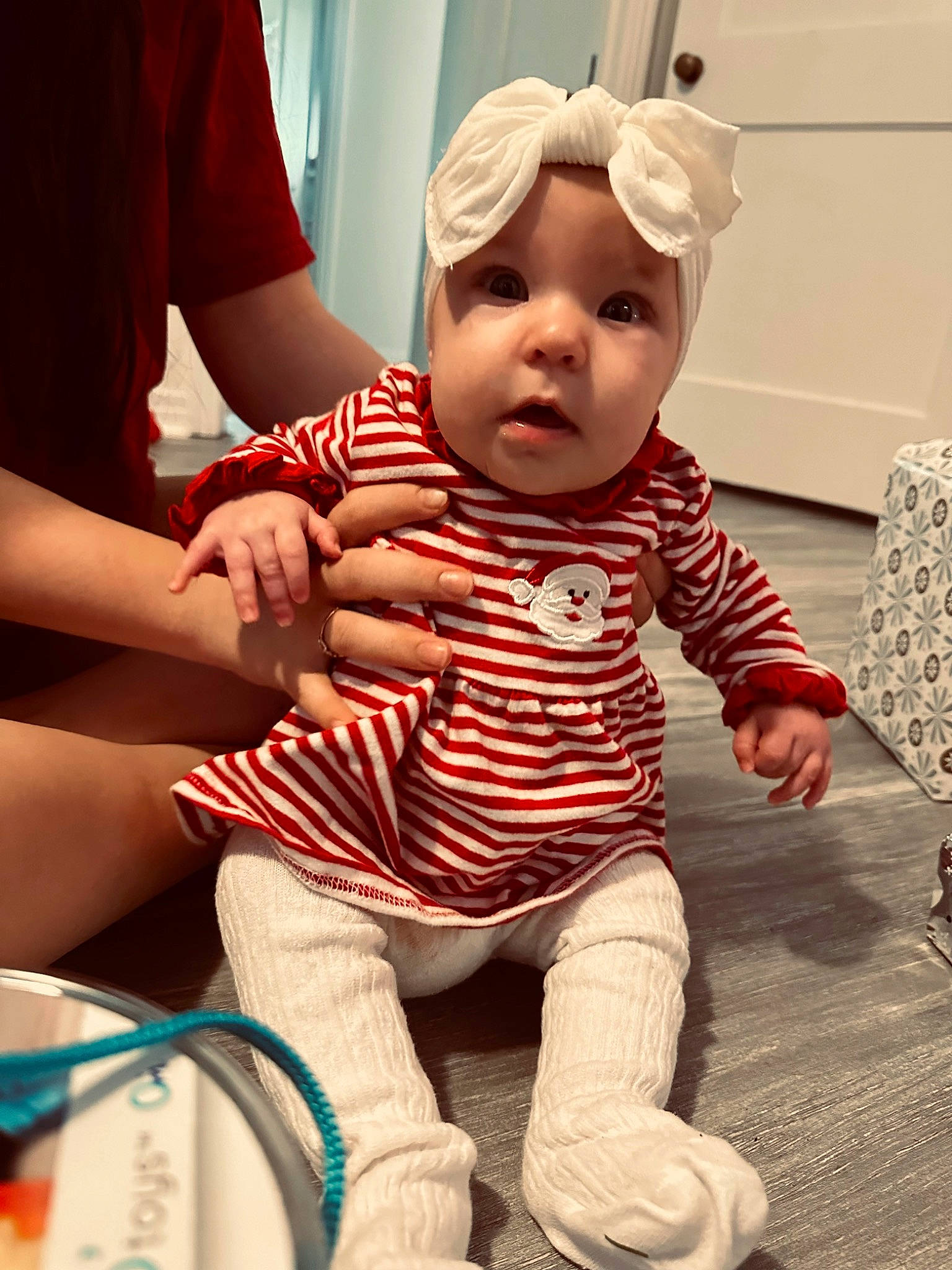 Oaklee joined the competition — help win amazing prizes! baby, baby_toddler_clothing, child, comfort, fun, gesture, happy, headwear, human, human_leg, knee, pattern, person, product, sitting, skin, sleeve, sock, standing, surprise