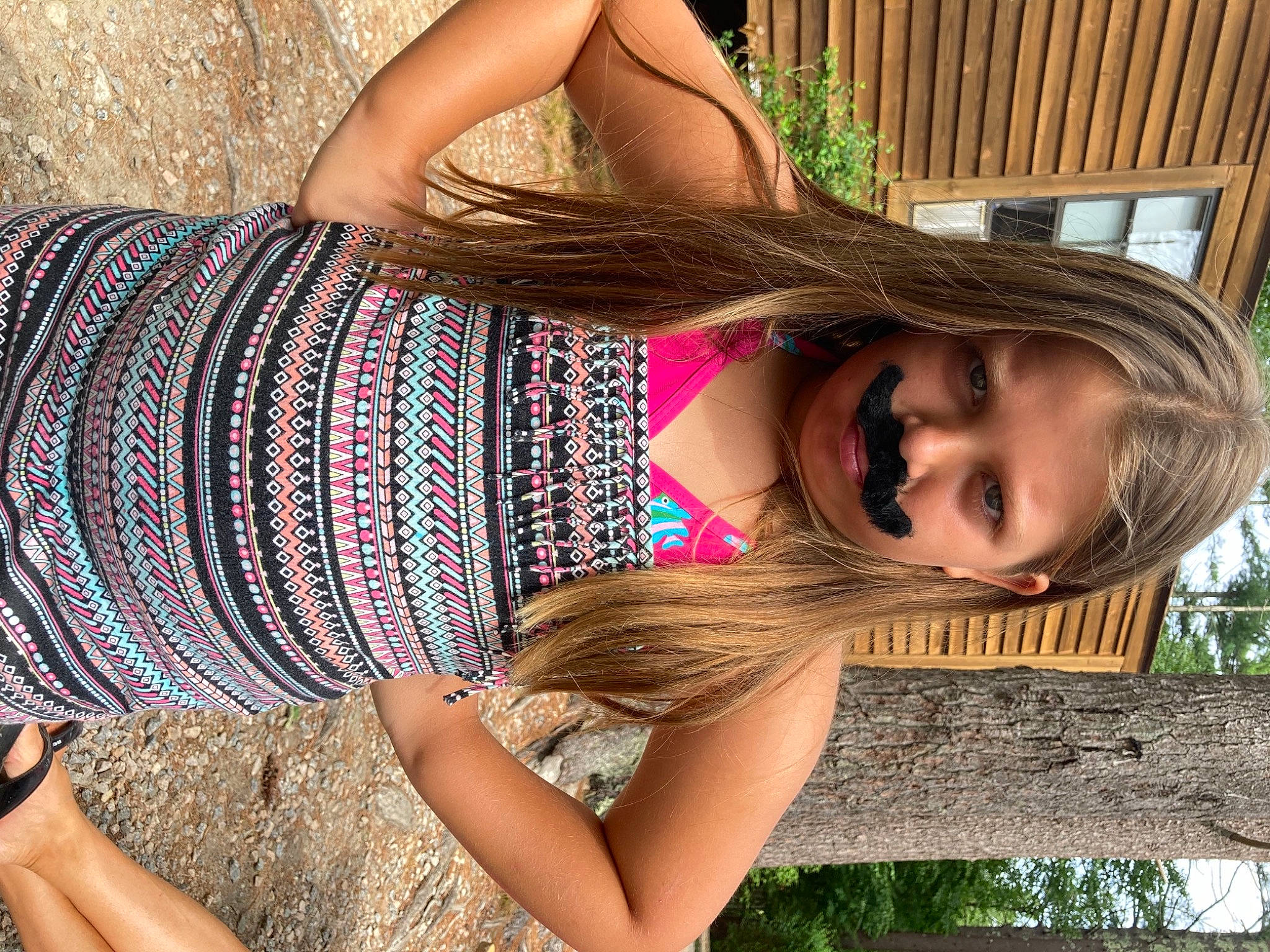 Sophia is registered to the contest to win money with this photo: beauty, black_hair, cool, elbow, grass, green, happy, joint, joy, knee, light, neck, people_in_nature, person, plant, smile, street_fashion, thigh, tree, trunk