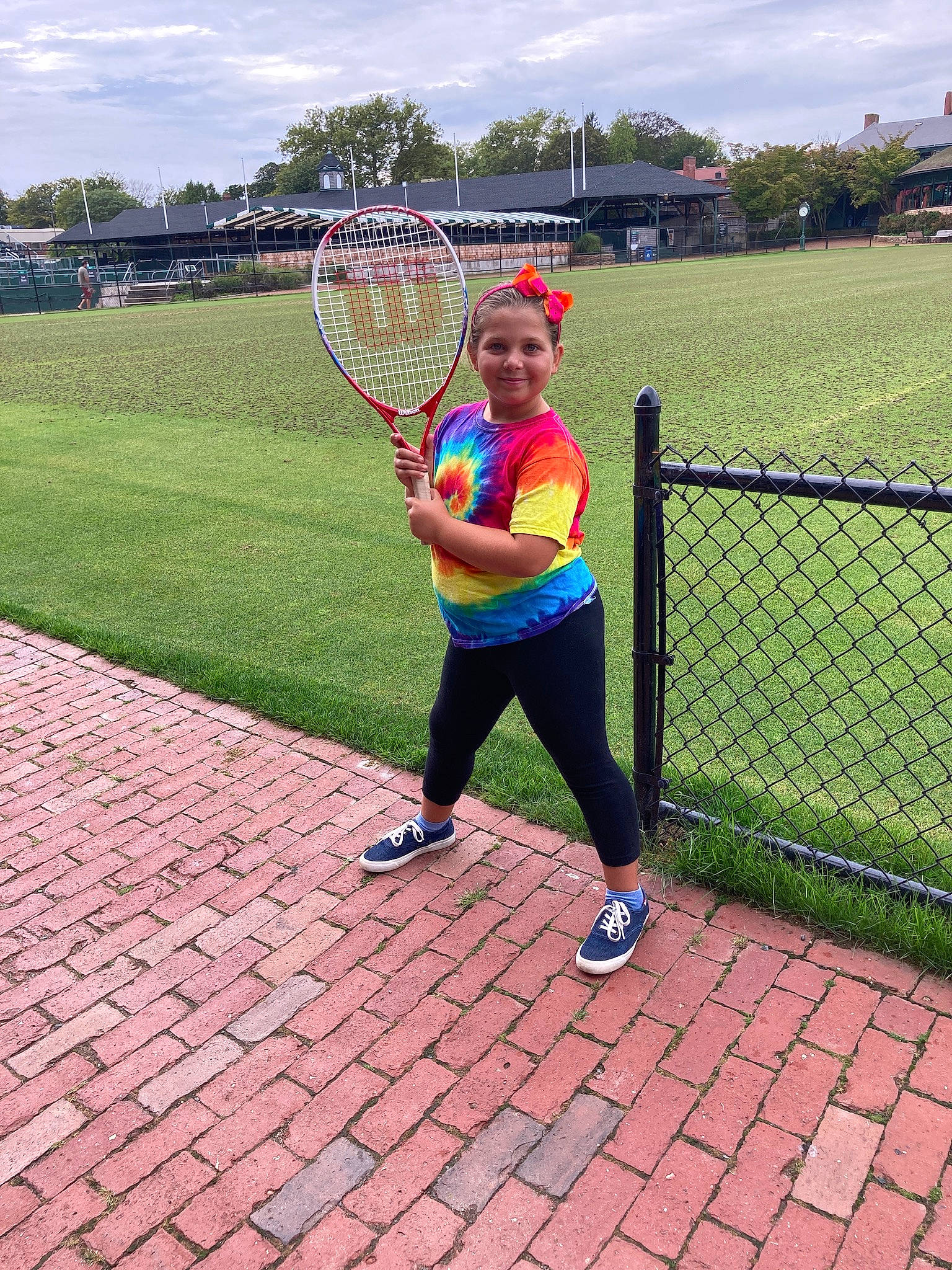 Sophia joined the competition — help win amazing prizes! cloud, footwear, headwear, joy, leg, people_in_nature, person, plant, playing_sports, racket, racketlon, racquet_sport, shoe, sky, soft_tennis, sports_equipment, strings, tennis, tennis_court, tennis_equipment